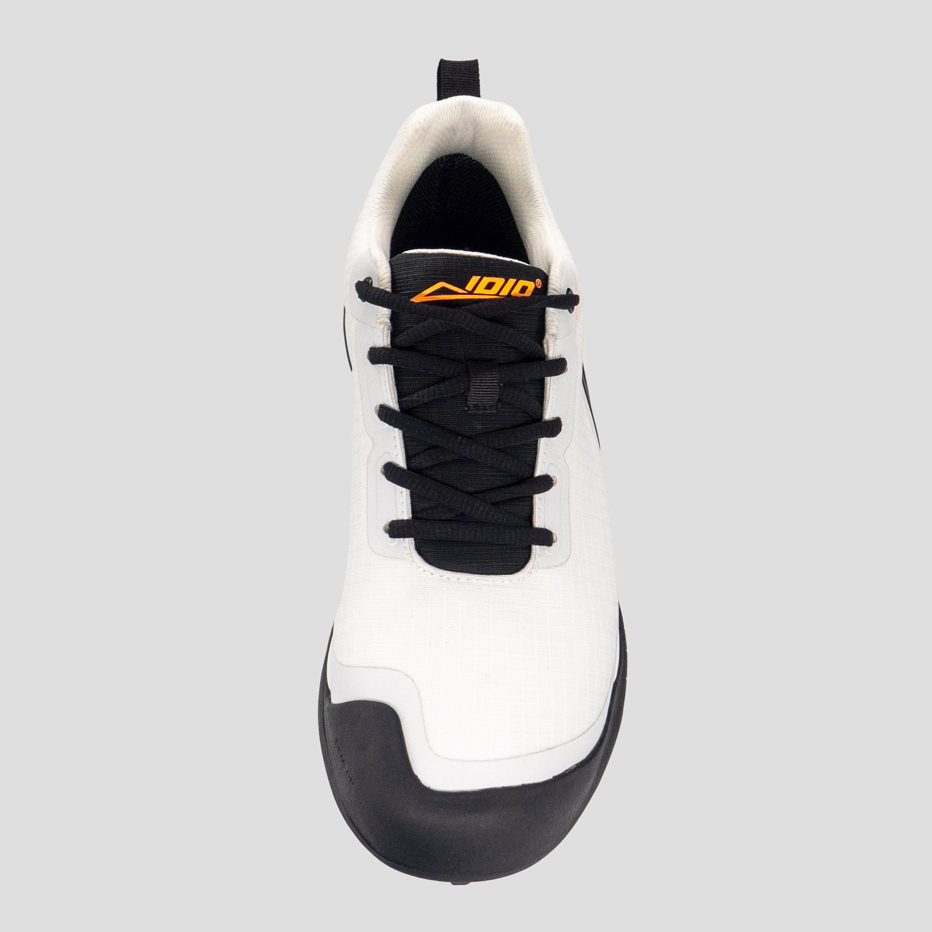 Top view of white/black disc golf shoe