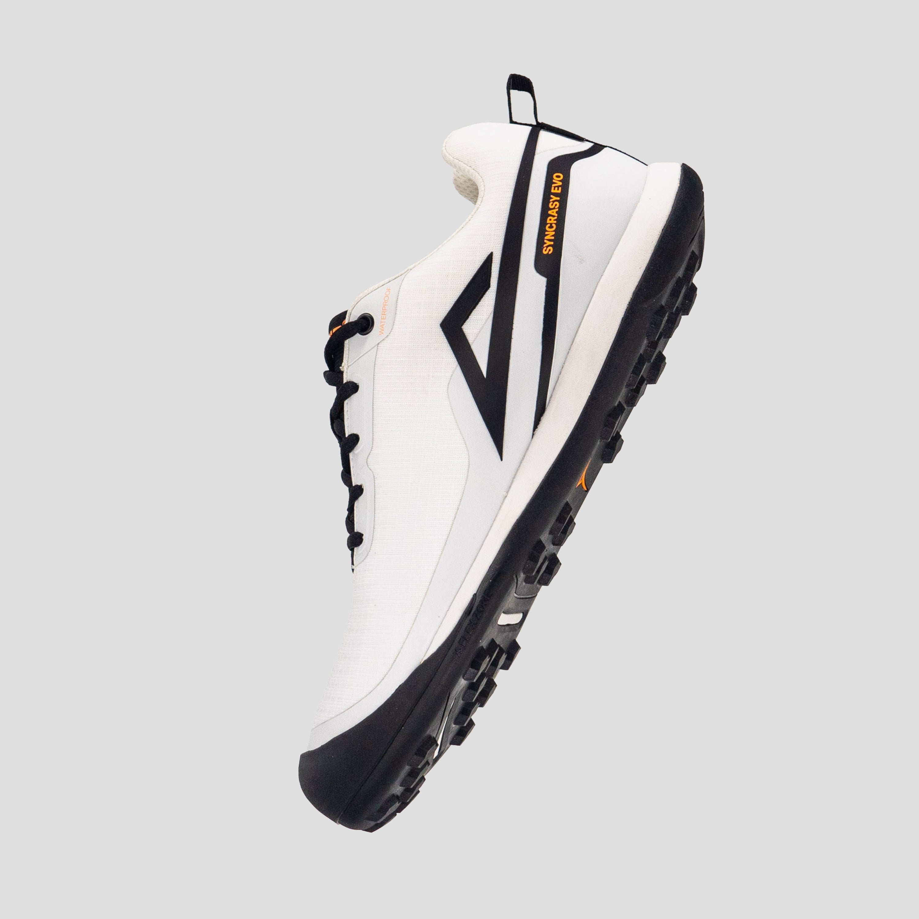 Lateral view of white/black disc golf shoe