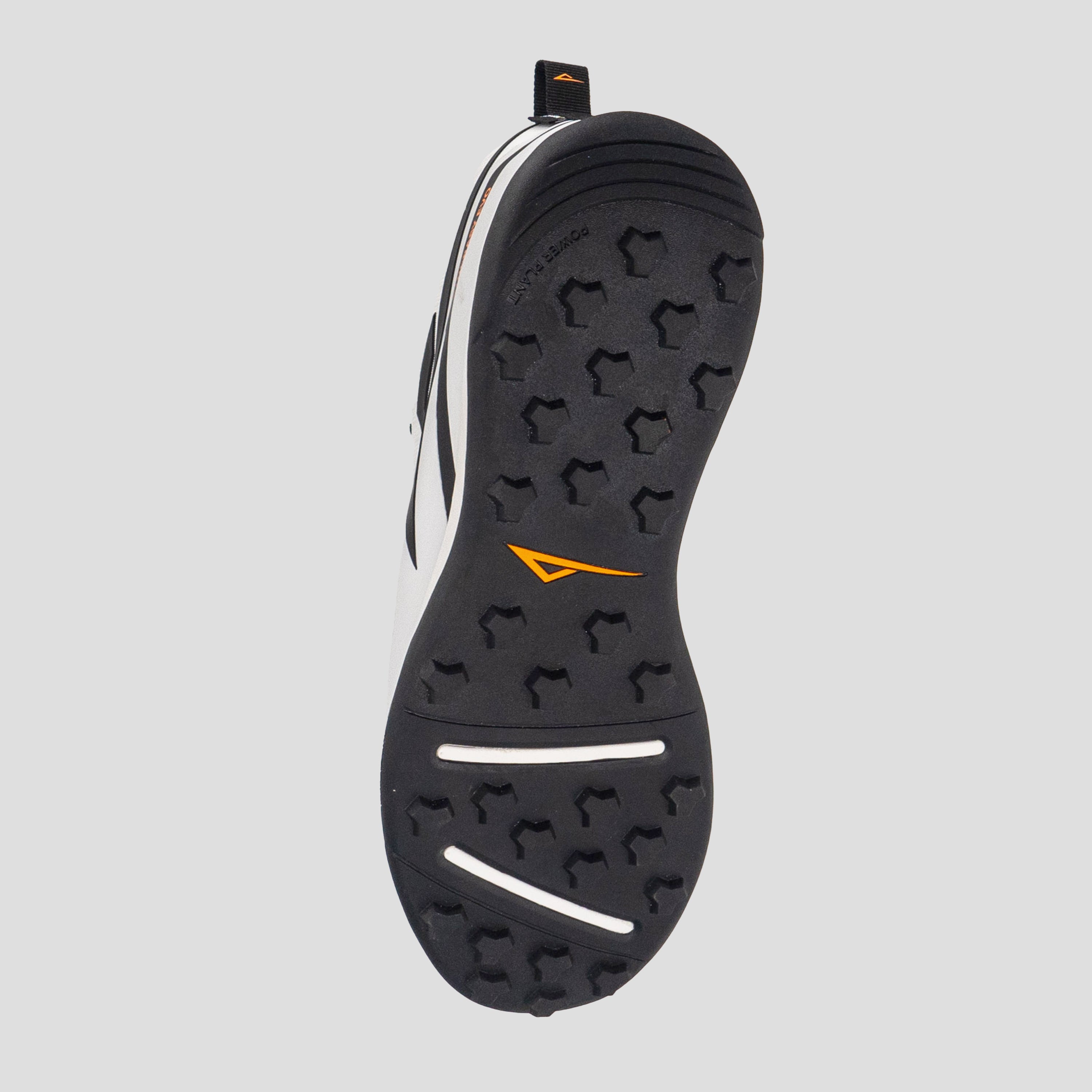 view of white/black disc golf shoe outsole