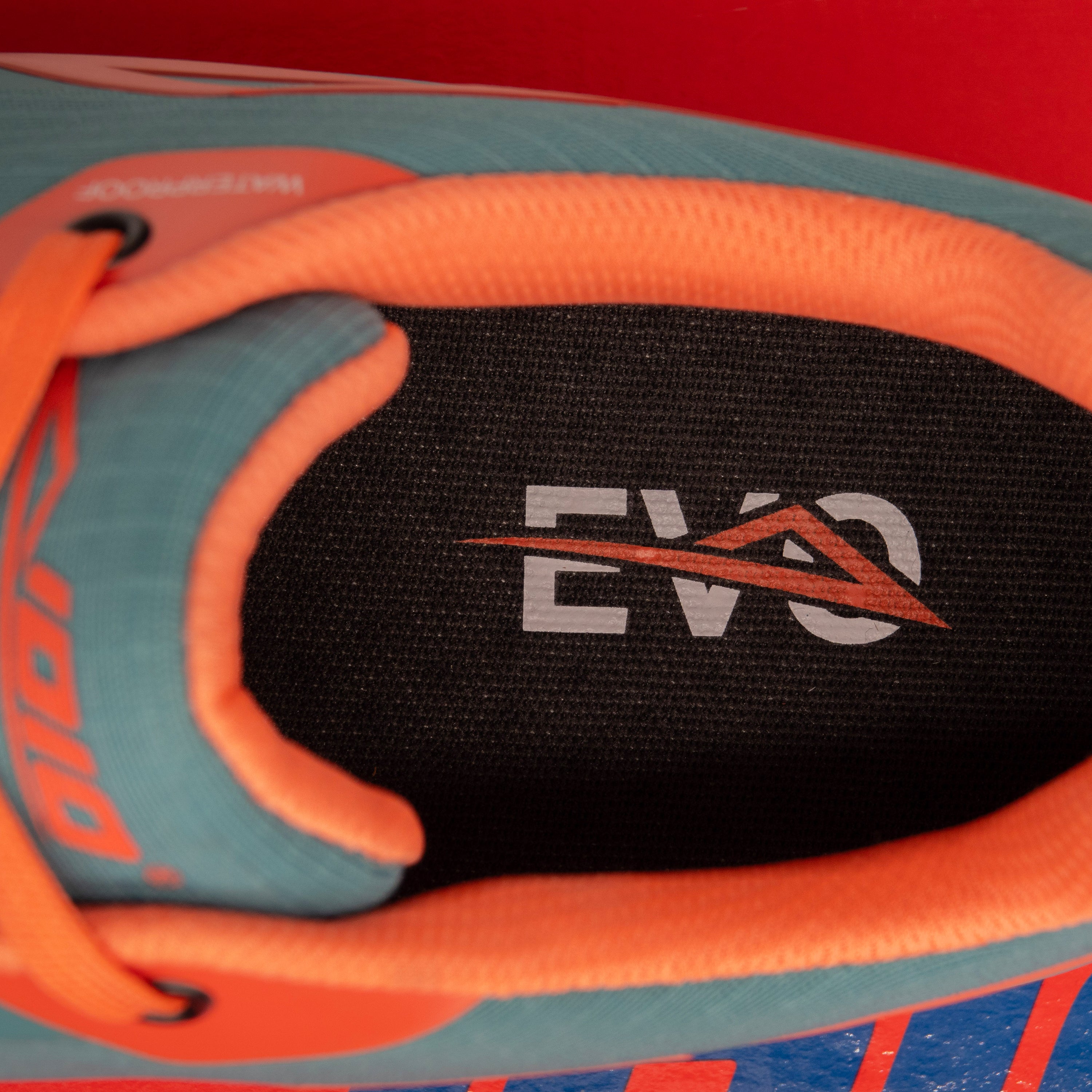 Inside view of Blue/orange disc golf shoe