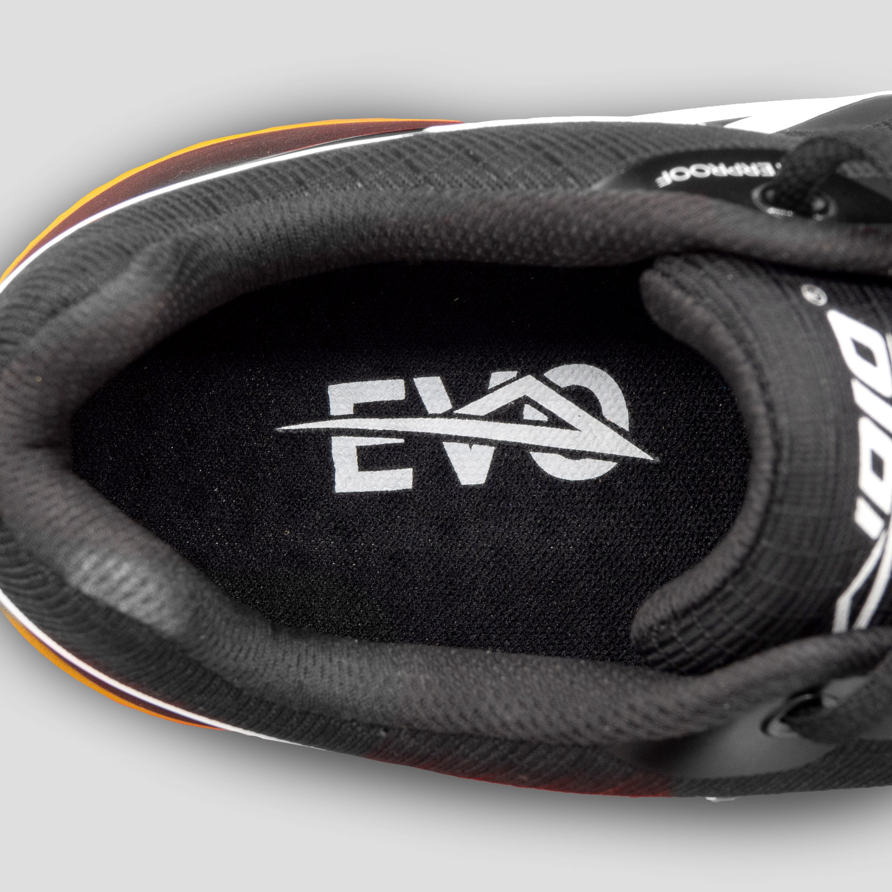 Inside view of black/gum disc golf shoe